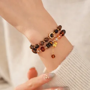 Bracelet en perles d'oeil de tigre avec breloque gourde et accents dorés doubles vintage