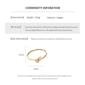 Size specifications and macro view of the minimalist gold-plated oval bangle with dimensions
