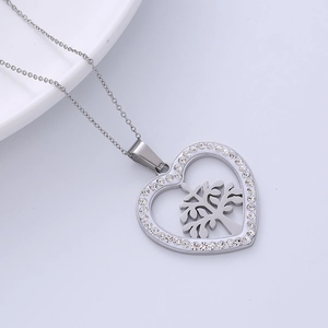 Silver heart pendant necklace with tree of life design and crystals for women