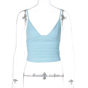 Detail view of light blue V-neck crop top with ruched texture and thin straps on mannequin