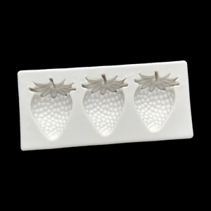 Detailed view of 3-cavity strawberry silicone mold for fondant and chocolate decorating