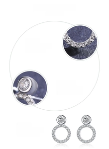 Macro detail of S925 sterling silver studs featuring 5A cubic zirconia stones