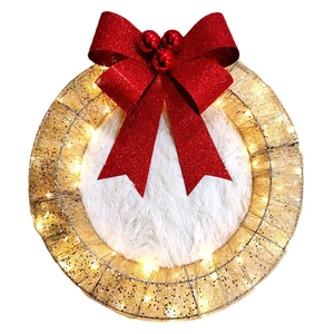 Golden Christmas wreath with warm LED lights, red glitter bow and white plush center