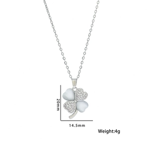 Silver clover necklace with crystals and shell inlay showing 20mm x 14.5mm dimensions