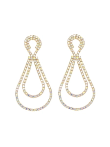 Macro detail of luxury gold teardrop earrings with shimmering Aurora Borealis crystals
