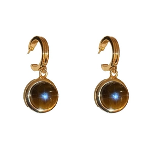 Golden C-shaped earrings with brown round tiger eye stone featuring starburst effect