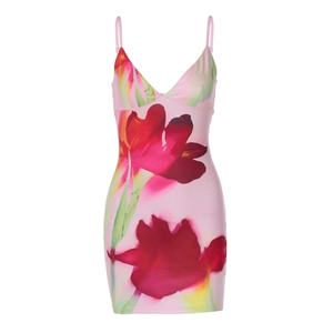Detail shot of the V-neckline and vibrant floral print on pink bodycon mini dress