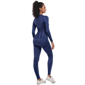Detail of navy seamless knit yoga set showing breathable mesh and compression texture
