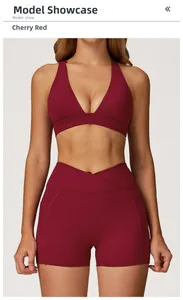 Deep V-neck sports bra and high-waisted shorts with criss-cross waistband and side pockets