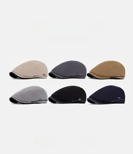 Detailed grid display of herringbone newsboy caps in six classic neutral colors