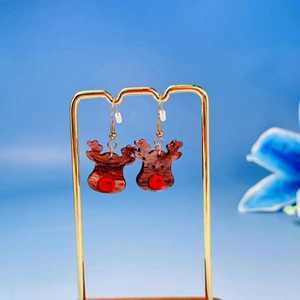 Cute brown acrylic reindeer earrings with red noses and gold hooks for Christmas