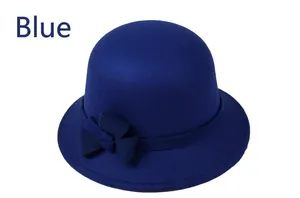 Close-up of royal blue wool cloche hat featuring a side bow detail for women