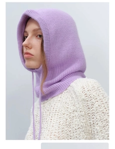 Detailed knit texture of a purple Balaclava hood with adjustable drawstrings