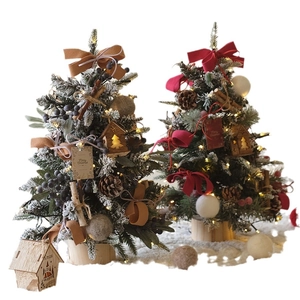 Mini PE Christmas tree with warm LED lights, felt balls and red velvet bows on a snow base