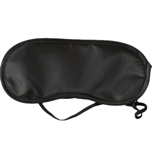 Black polyester blackout sleep eye mask with elastic strap for travel and hotel use