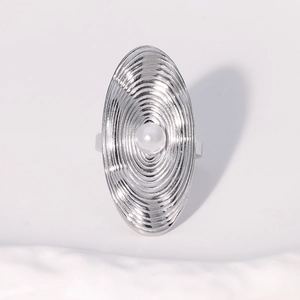 Chic silver stainless steel oval ring with central pearl and concentric textures