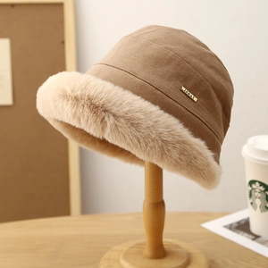 Winter plush bucket hat in brown with beige faux fur trim and gold ISHAT metal tag
