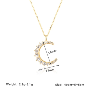 Macro shot of S925 silver crescent moon pendant with pave set zircons and detailed dimensions