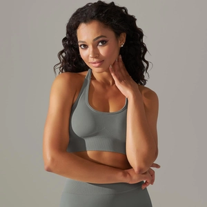 Close-up of seamless gray sports bra featuring a ribbed hem and breathable performance fabric