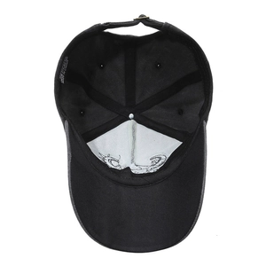Internal view of black 100% cotton baseball cap with durable cross reinforcement and metal buckle