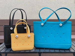 Detailed comparison of three sizes of waterproof EVA beach tote bags in black, blue and yellow