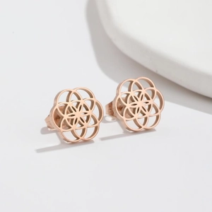 Elegant rose gold cutout flower earrings with a minimalist geometric petal design