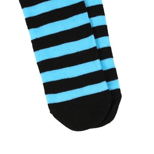Detailed close-up of knitted fabric texture and blue-black stripes on toe of knee-high sock