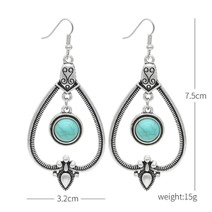 Detailed dimensions of Bohemian turquoise feather earrings with size and weight markings
