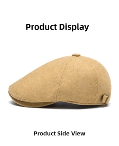 Detail of wool flat cap showing the vintage texture and metal adjustable side buckle