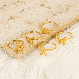 Five-piece 18K gold-plated titanium steel ring set with starfish and bow designs