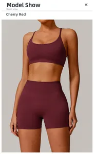 Detail of seamless yoga set in cherry red featuring moisture-wicking stretch fabric