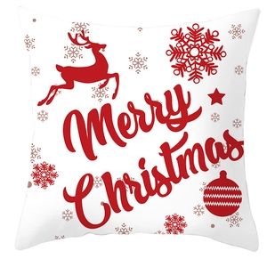 Detail of white Christmas pillowcase with red Merry Christmas text and reindeer motifs