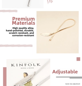 Detail of leaf-shaped metal buckle and adjustable spring chain on stylish waist belt