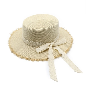 Lace bow raffia sun hat with elegant flat top and frayed edges for summer vacation wear