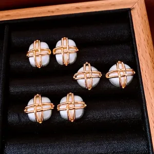 Three pairs of retro French style gold-plated cross metal frame pearl stud earrings