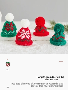 Detailed view of mini knitted Christmas hats with snowflake patterns and plush pom-poms