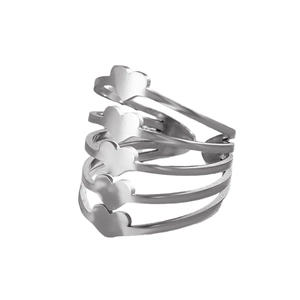 Macro detail of silver multi-layer spiral ring with polished heart charms
