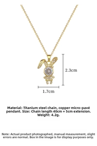 Detail of bunny pendant with micro-pave zircons and dimensions of 1.7 by 2.3 cm