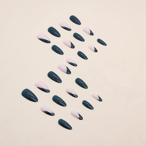 Navy blue almond press-on nails with French tip design and silver glitter accents