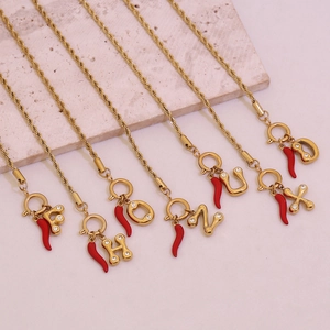 Golden rope chain bracelet with red chili cornicello and zircon letter pendants