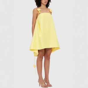 Satin yellow mini dress with floral strap detail for summer holiday fashion