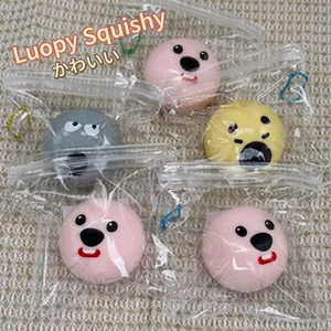 Macro shot of multiple colorful Loopy character squishy toys in clear plastic bags