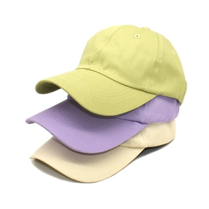 Classic cotton baseball caps in light green, lavender and beige for outdoor sun protection