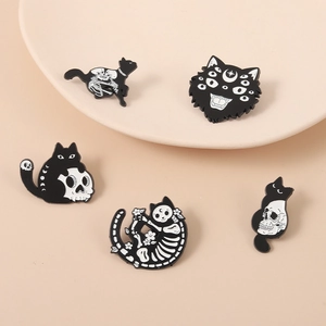 Gothic ghost cat and skeleton enamel pin set with moon and floral details in black and white