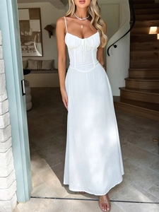 Elegant white camisole maxi dress with a corset-style bodice and flowing A-line skirt