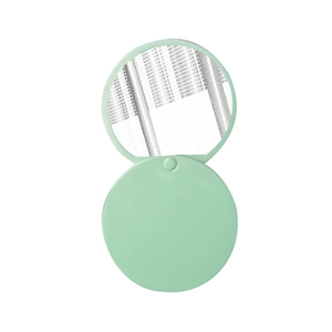 Portable light green round folding makeup mirror with slide cover on white background