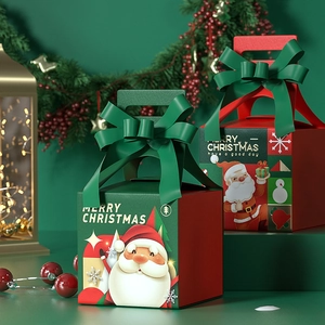 Christmas gift boxes with Santa design and green silk ribbon bows for holiday packaging