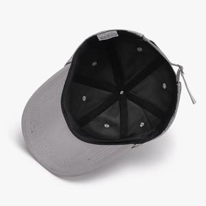Internal view of gray cotton baseball cap with black lining and metal adjustment buckle