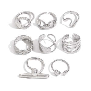 Set of 8 silver stainless steel rings with twisted rope and geometric hollow designs