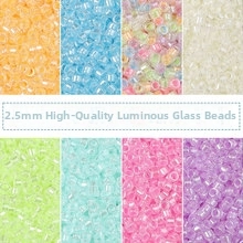 Detailed view of 2.5mm luminous glass seed beads in multiple bright colors for DIY jewelry